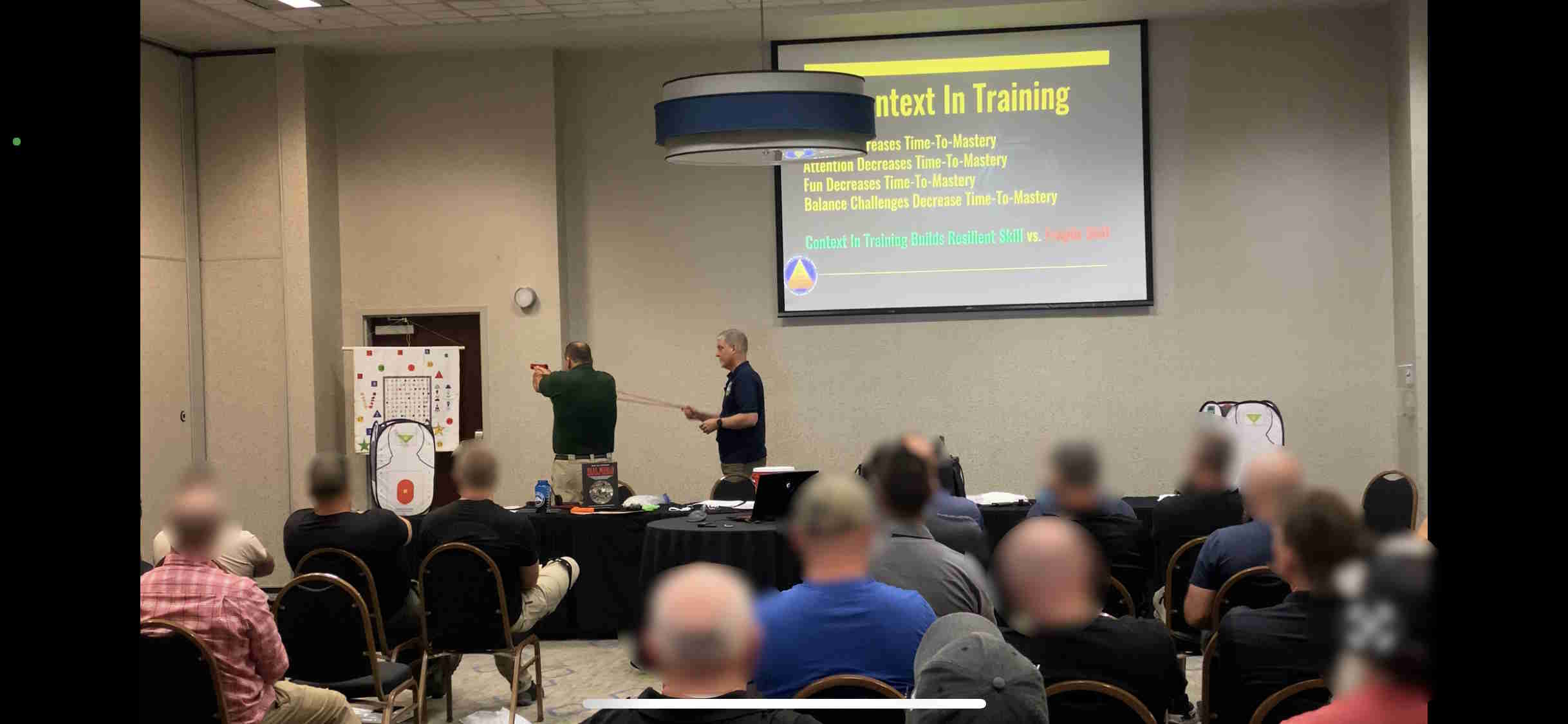 Teaching at WSLEFIA (audience blurred for privacy)